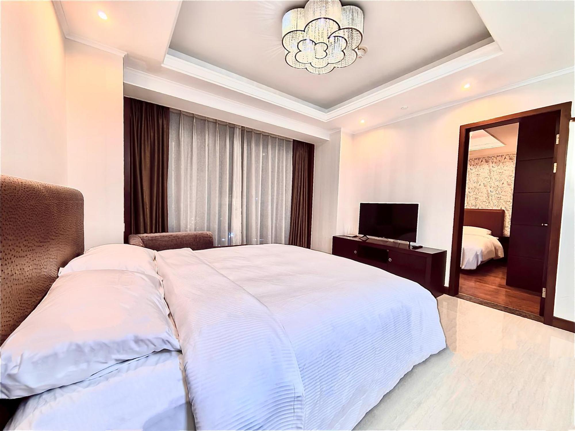 Qingdao Elegant Central Apartment Exterior foto