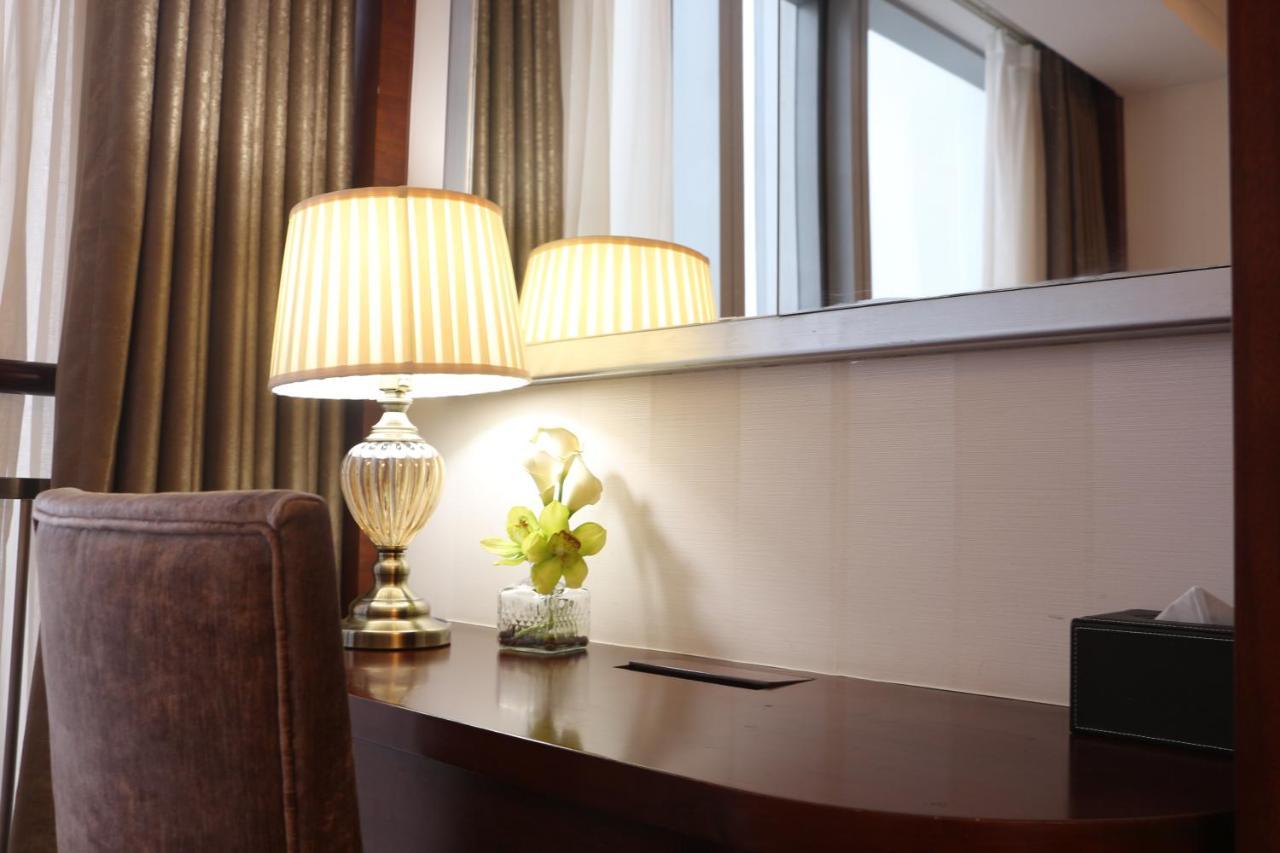 Qingdao Elegant Central Apartment Exterior foto